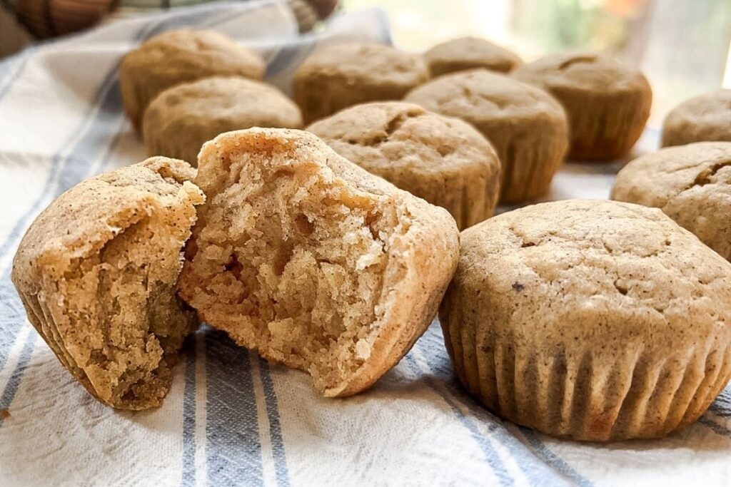 showing the how light and fluffy the inside of the maple and honey banana muffins
