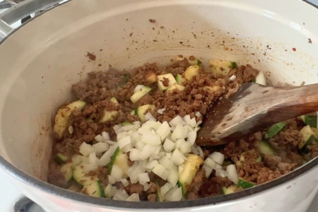onions added to frying skillet