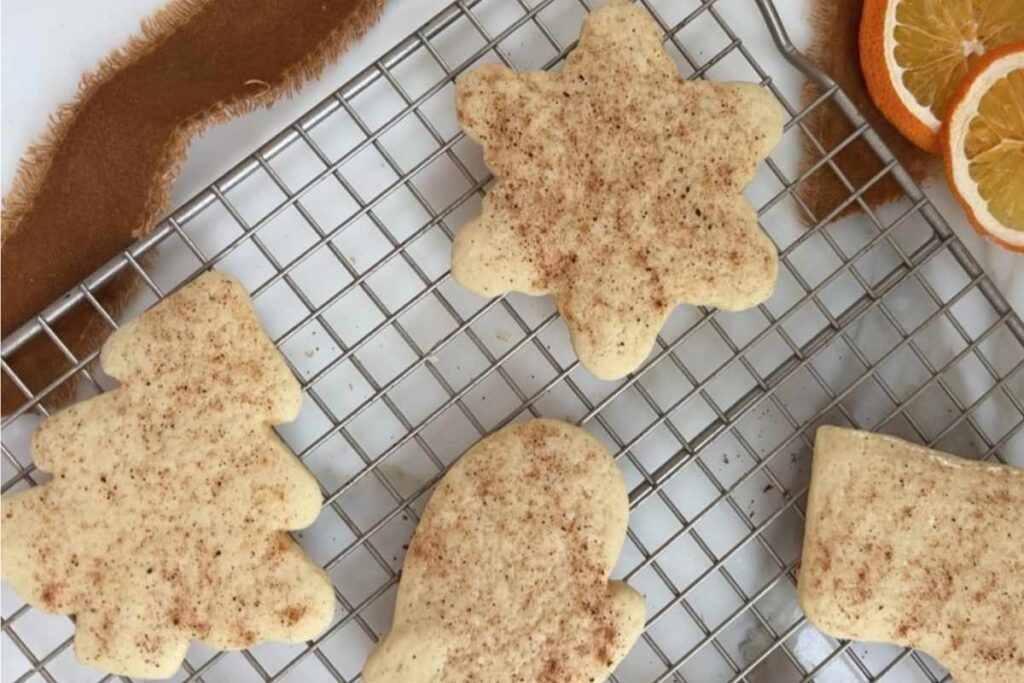 sour cream sugar cookies cooling on rack